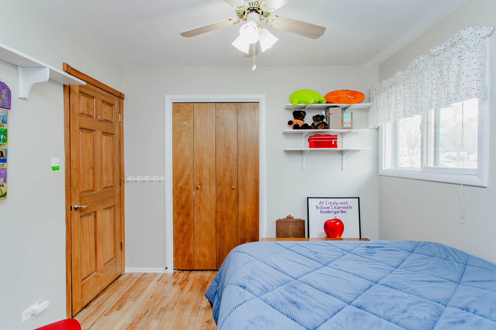 1685 Kent Road Hoffman Estates, IL 60169 - Photo 17 of 31 a bedroom with a bed and a window