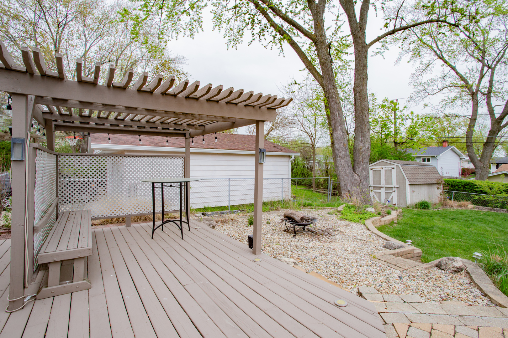 1685 Kent Road Hoffman Estates, IL 60169 - Photo 28 of 31 a building with trees in front of it