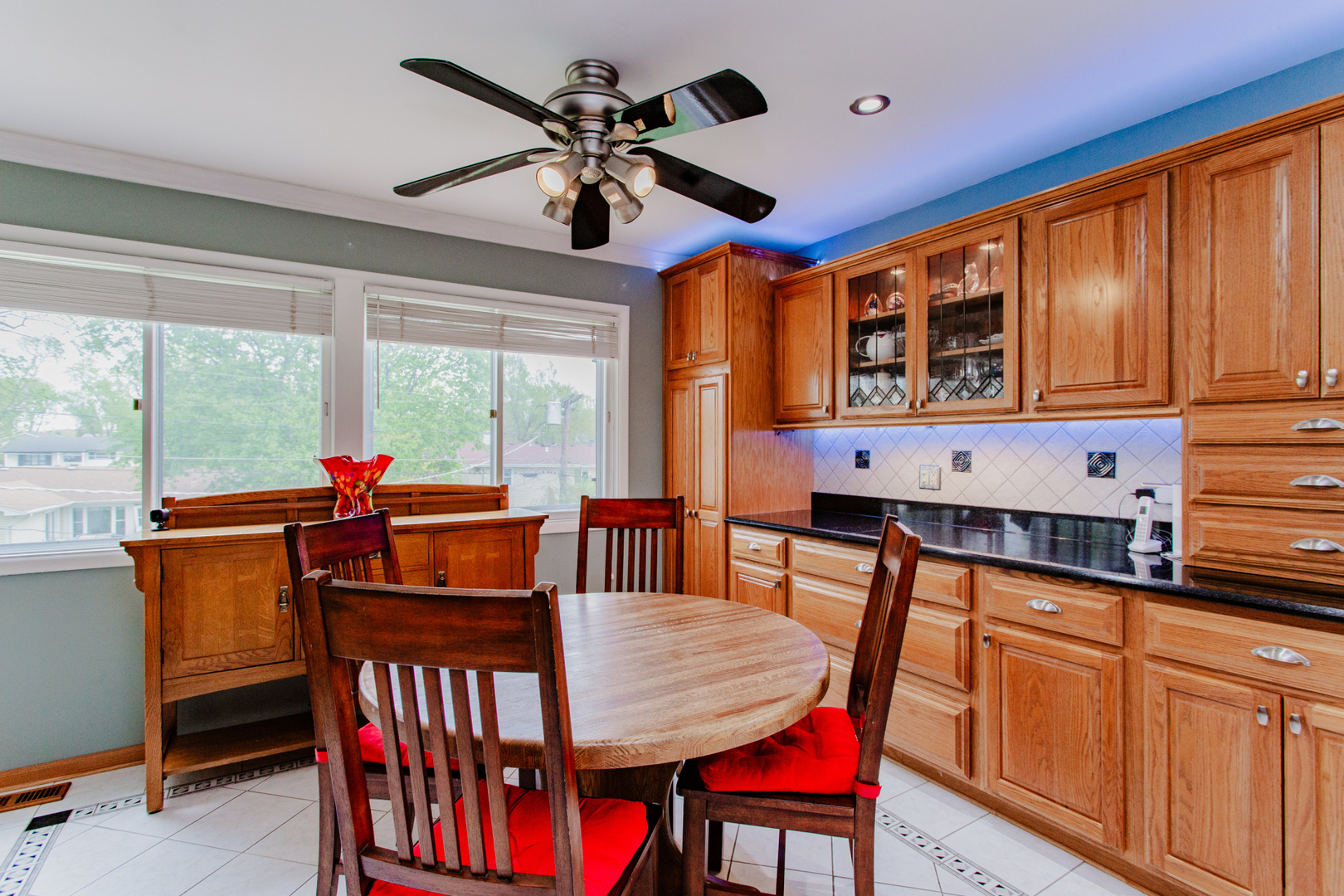1685 Kent Road Hoffman Estates, IL 60169 - Photo 8 of 31 a view of a dining room with furniture window and outside view