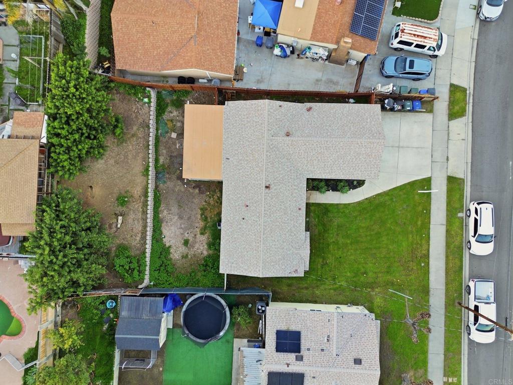 738 Carlsbad Street Spring Valley, CA 91977 - Photo 18 of 40 an aerial view of residential houses with outdoor space and parking