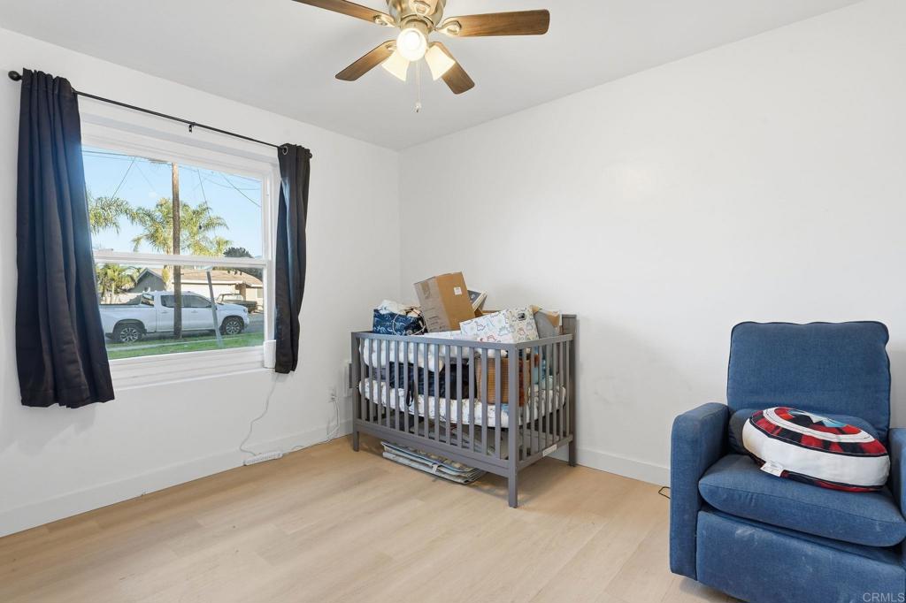 738 Carlsbad Street Spring Valley, CA 91977 - Photo 22 of 40 a bedroom with furniture and a window