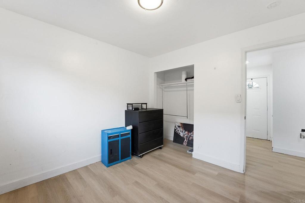 738 Carlsbad Street Spring Valley, CA 91977 - Photo 24 of 40 a view of a room with wooden floor