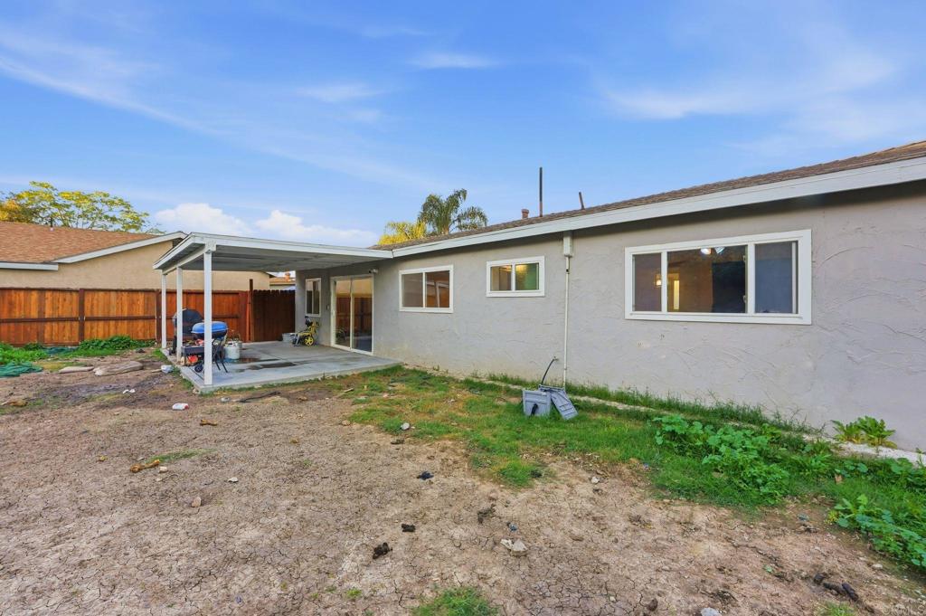 738 Carlsbad Street Spring Valley, CA 91977 - Photo 35 of 40 a view of a house with backyard and sitting area