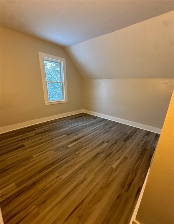 26 Green Street Monson, MA 01057 - Photo 26 of 38 a view of an empty room with wooden floor and a window