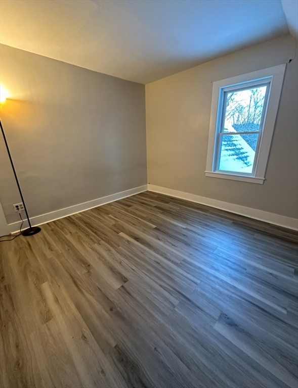 26 Green Street Monson, MA 01057 - Photo 27 of 38 an empty room with wooden floor and windows
