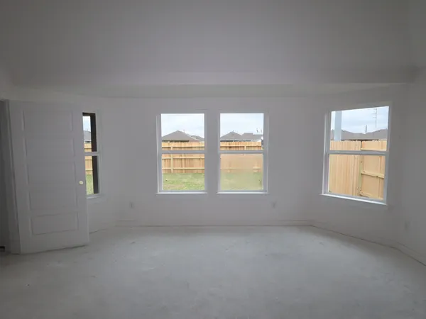 an aerial view of a house with a ocean view