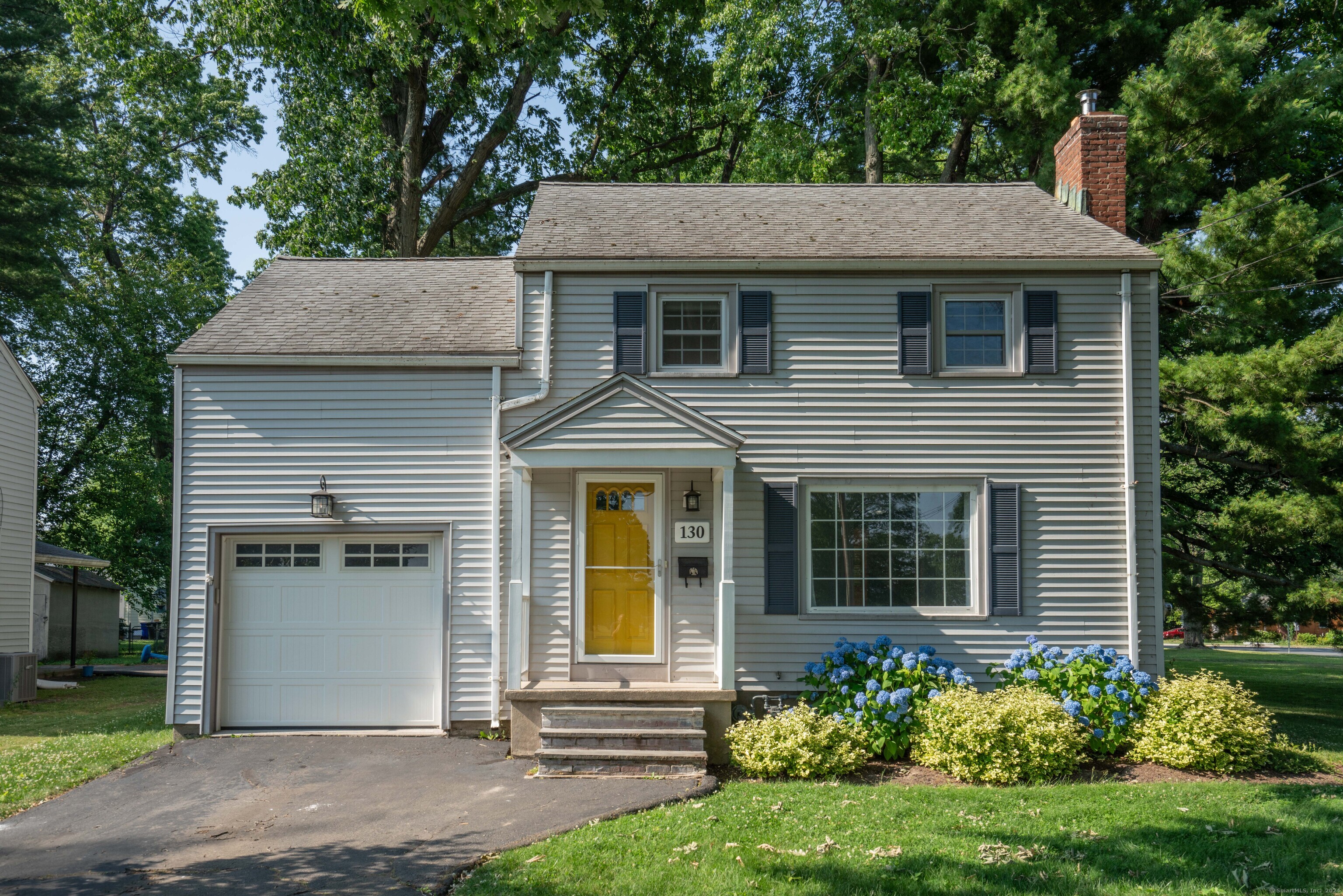 a house that has a lot of plants in it