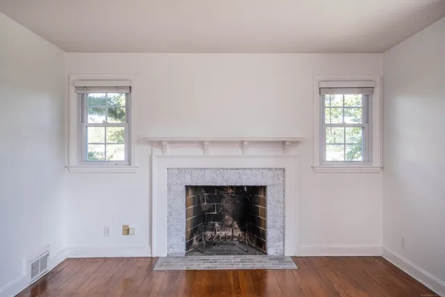 a living room with a fireplace