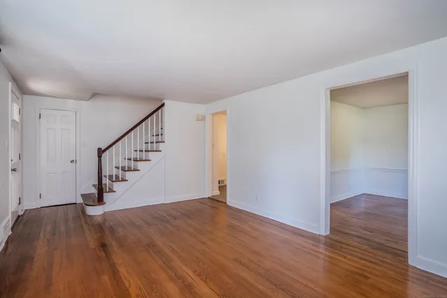 a view of entryway with wooden floor