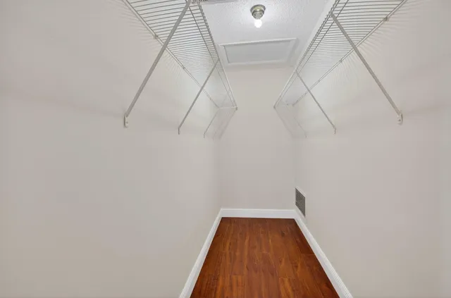 a view of a room with racks on the wall