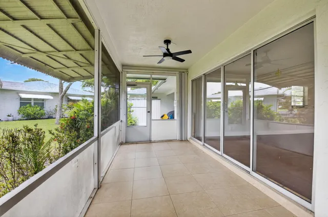 a view of a room with a large window