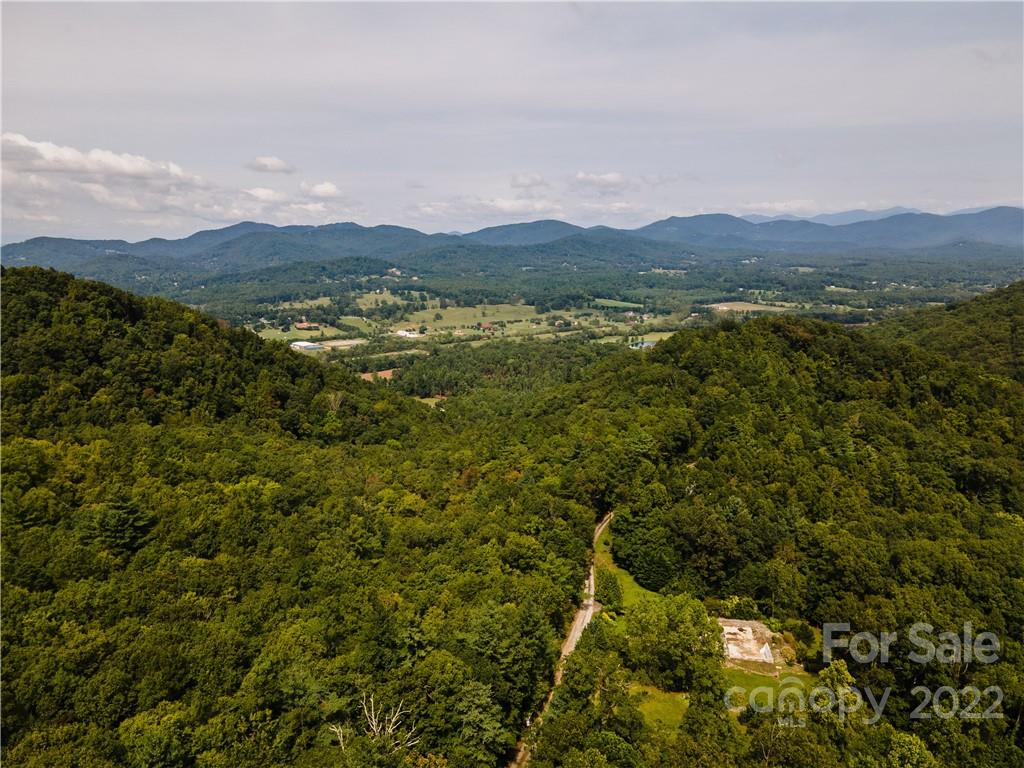 0 Shadow Ridge Drive Fletcher, NC 28732 - Photo 15 of 37 a view of a town with mountains in the background
