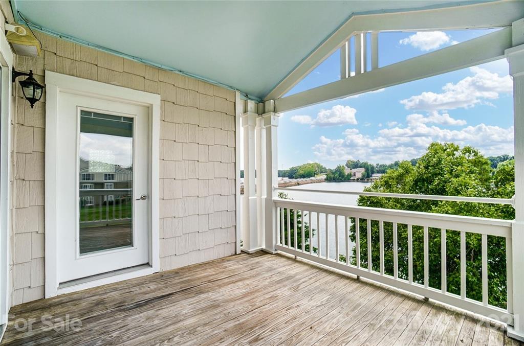 1342 Torrence Circle Davidson, NC 28036 - Photo 30 of 39 a view of a balcony with wooden floor