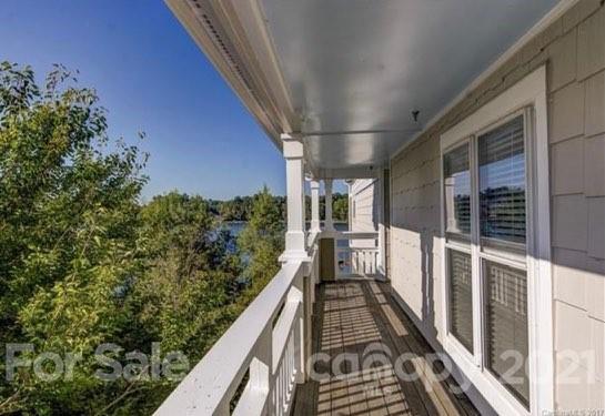 1342 Torrence Circle Davidson, NC 28036 - Photo 33 of 39 a view of balcony with wooden floor