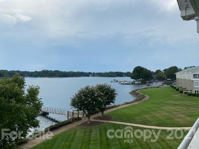1342 Torrence Circle Davidson, NC 28036 - Photo 34 of 39 a view of a lake from a yard
