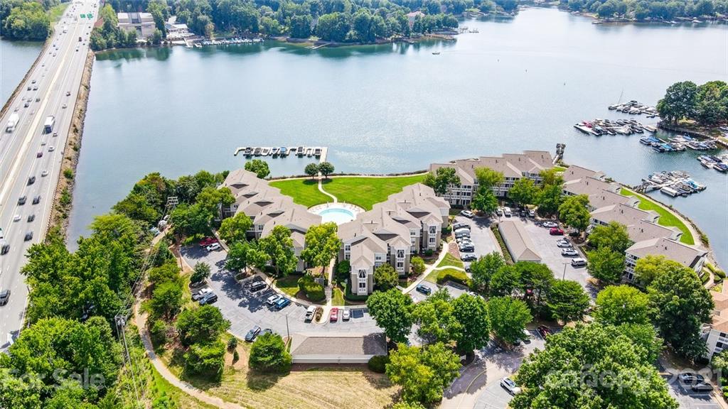 1342 Torrence Circle Davidson, NC 28036 - Photo 38 of 39 an aerial view of a house with a lake view