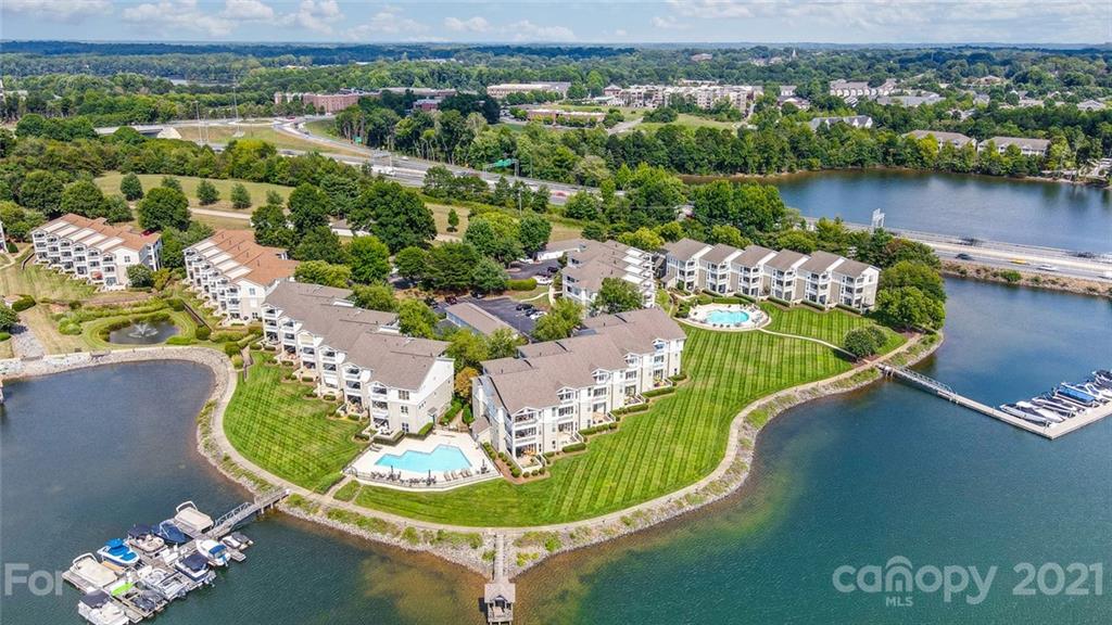 1342 Torrence Circle Davidson, NC 28036 - Photo 5 of 39 an aerial view of a house with a lake view