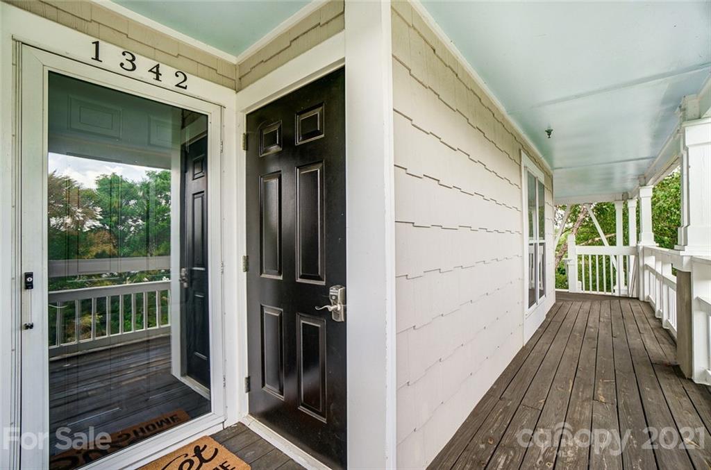 1342 Torrence Circle Davidson, NC 28036 - Photo 7 of 39 a view of a balcony with wooden floor