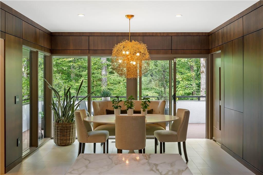 1640 Winterthur Close Northwest Atlanta, GA 30328 - Photo 11 of 57 a view of a dining room with furniture window and outside view