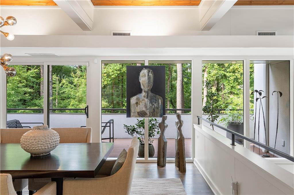 1640 Winterthur Close Northwest Atlanta, GA 30328 - Photo 12 of 57 a view of a dining room with furniture window and outside view