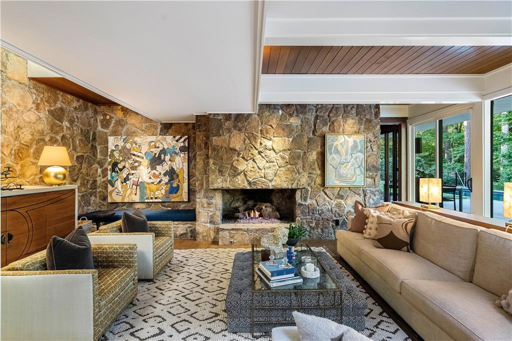 1640 Winterthur Close Northwest Atlanta, GA 30328 - Photo 19 of 57 a living room with furniture and a large window