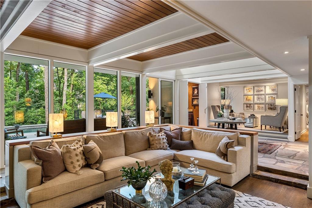 1640 Winterthur Close Northwest Atlanta, GA 30328 - Photo 29 of 57 a living room with furniture and large windows