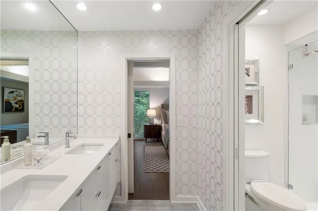 a bathroom with a bathtub and shower