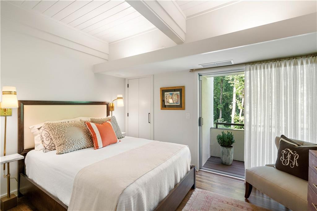 1640 Winterthur Close Northwest Atlanta, GA 30328 - Photo 41 of 57 a bedroom with a bed and a couch