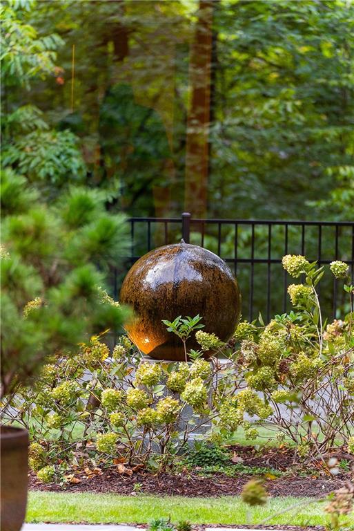 1640 Winterthur Close Northwest Atlanta, GA 30328 - Photo 49 of 57 a backyard of a house with lots of green space