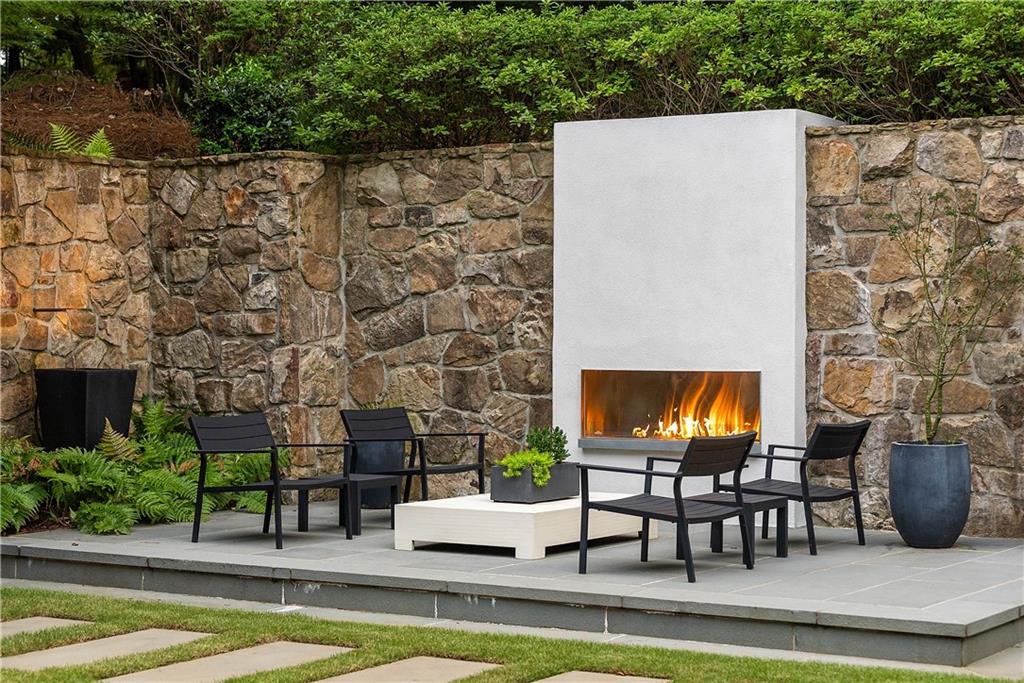 1640 Winterthur Close Northwest Atlanta, GA 30328 - Photo 57 of 57 a view of a swimming pool with seating area