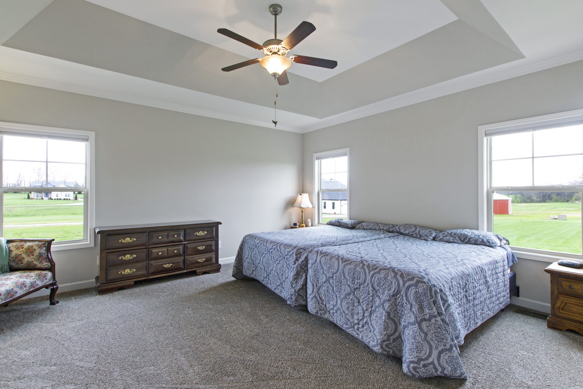 1091 Caballo Trail Gallatin, TN 37066 - Photo 13 of 30 a bedroom with a bed and a chandelier