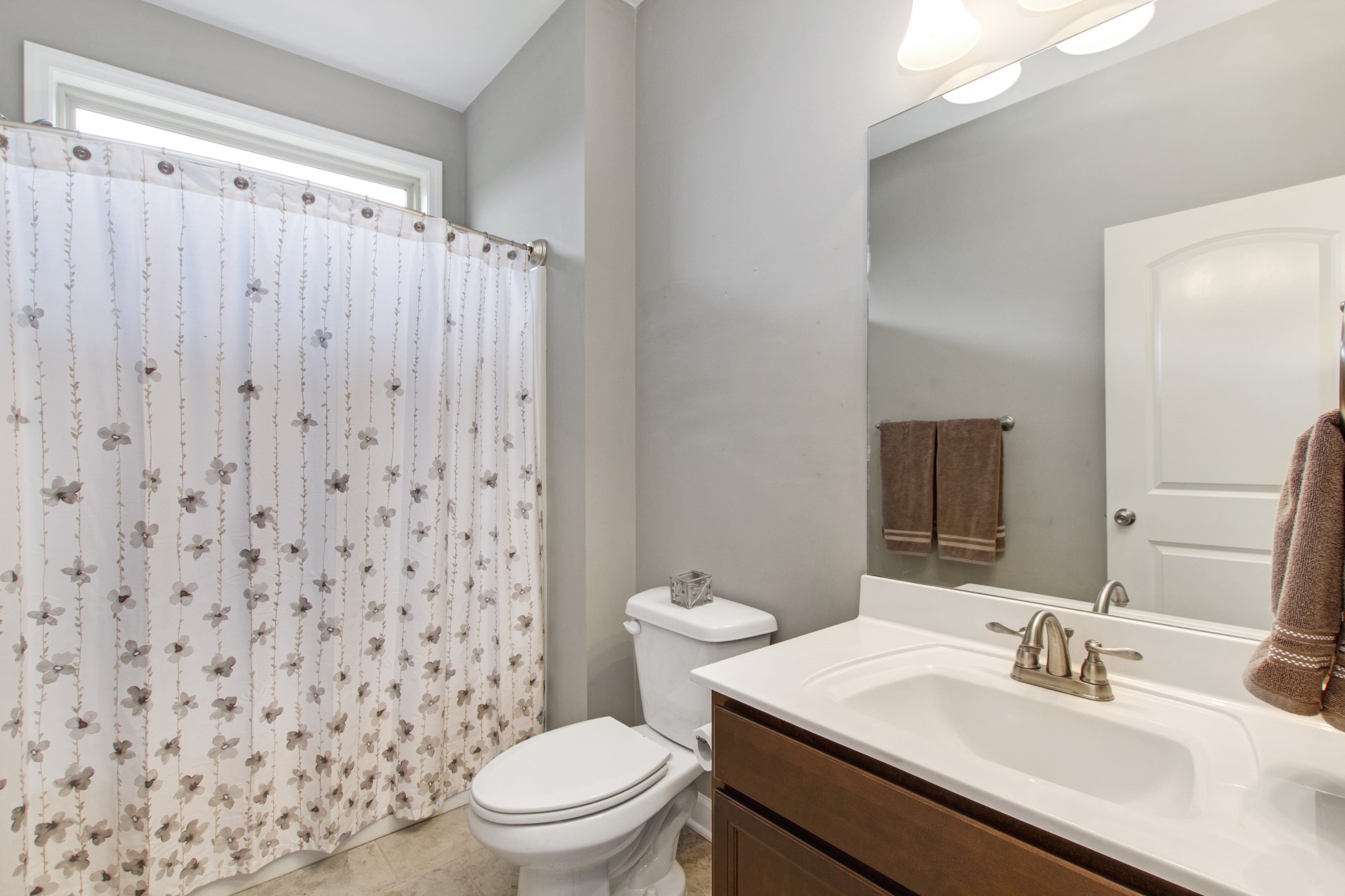 1091 Caballo Trail Gallatin, TN 37066 - Photo 19 of 30 a bathroom with a sink a toilet and a mirror