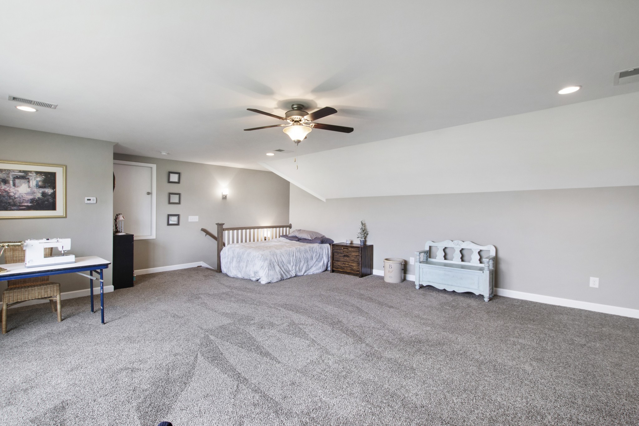 1091 Caballo Trail Gallatin, TN 37066 - Photo 22 of 30 a spacious bedroom with a bed and a table