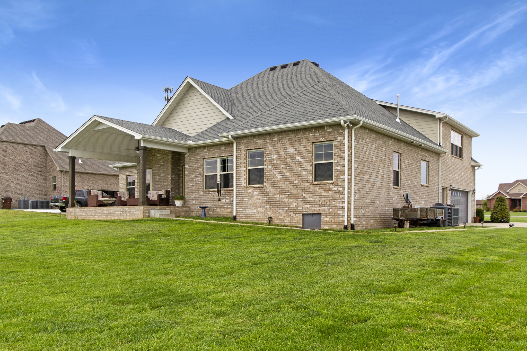 1091 Caballo Trail Gallatin, TN 37066 - Photo 28 of 30 a front view of a house with a garden and yard