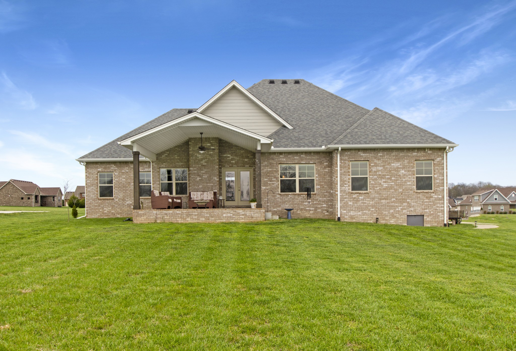 1091 Caballo Trail Gallatin, TN 37066 - Photo 29 of 30 a front view of a house with swimming pool having outdoor seating