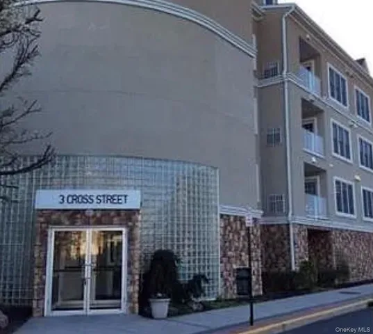 a front view of a building with glass windows