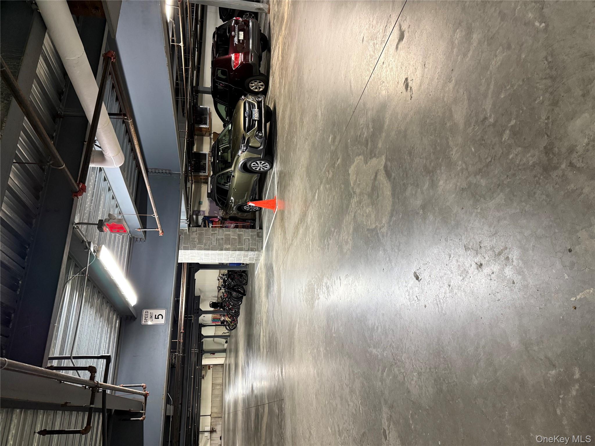 3 Cross Street, Unit 304 Suffern, NY 10901 - Photo 16 of 18 a car parked in parking