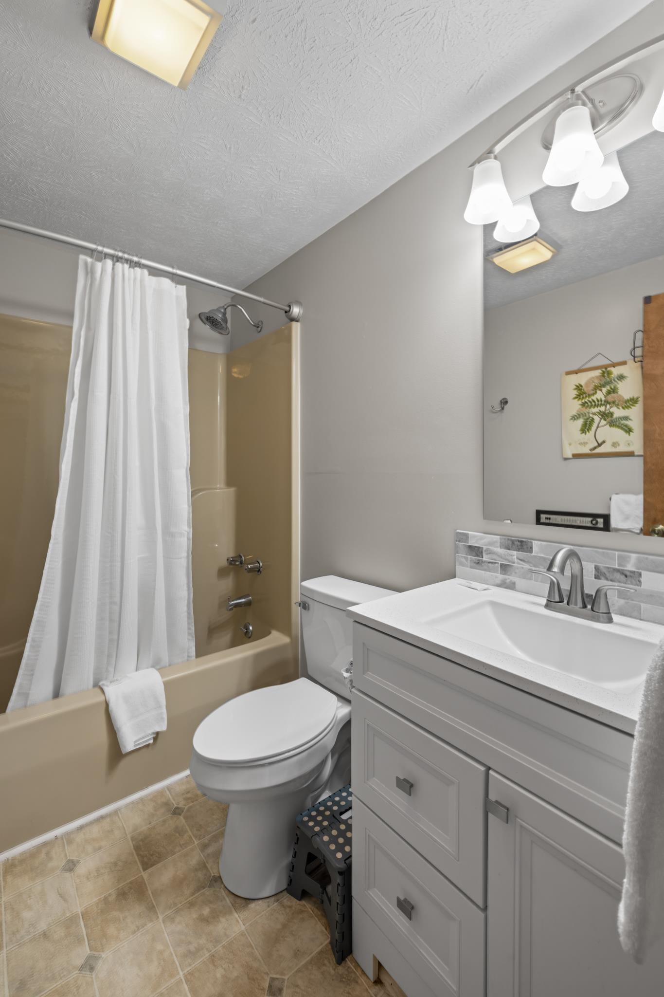 673 Killmon Road Basye, VA 22810 - Photo 22 of 74 a bathroom with a toilet a sink and a mirror