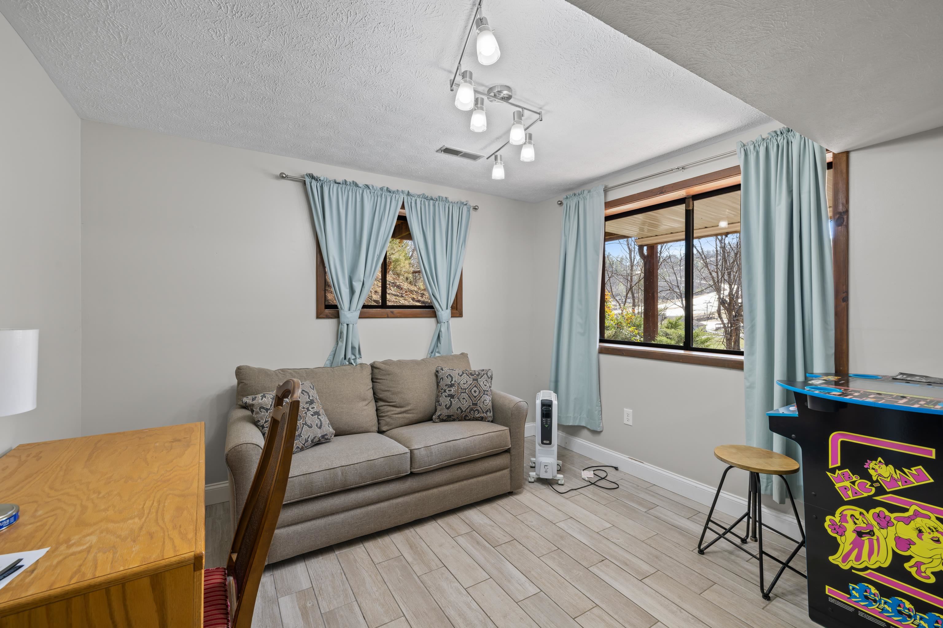 673 Killmon Road Basye, VA 22810 - Photo 42 of 74 a living room with furniture and a window