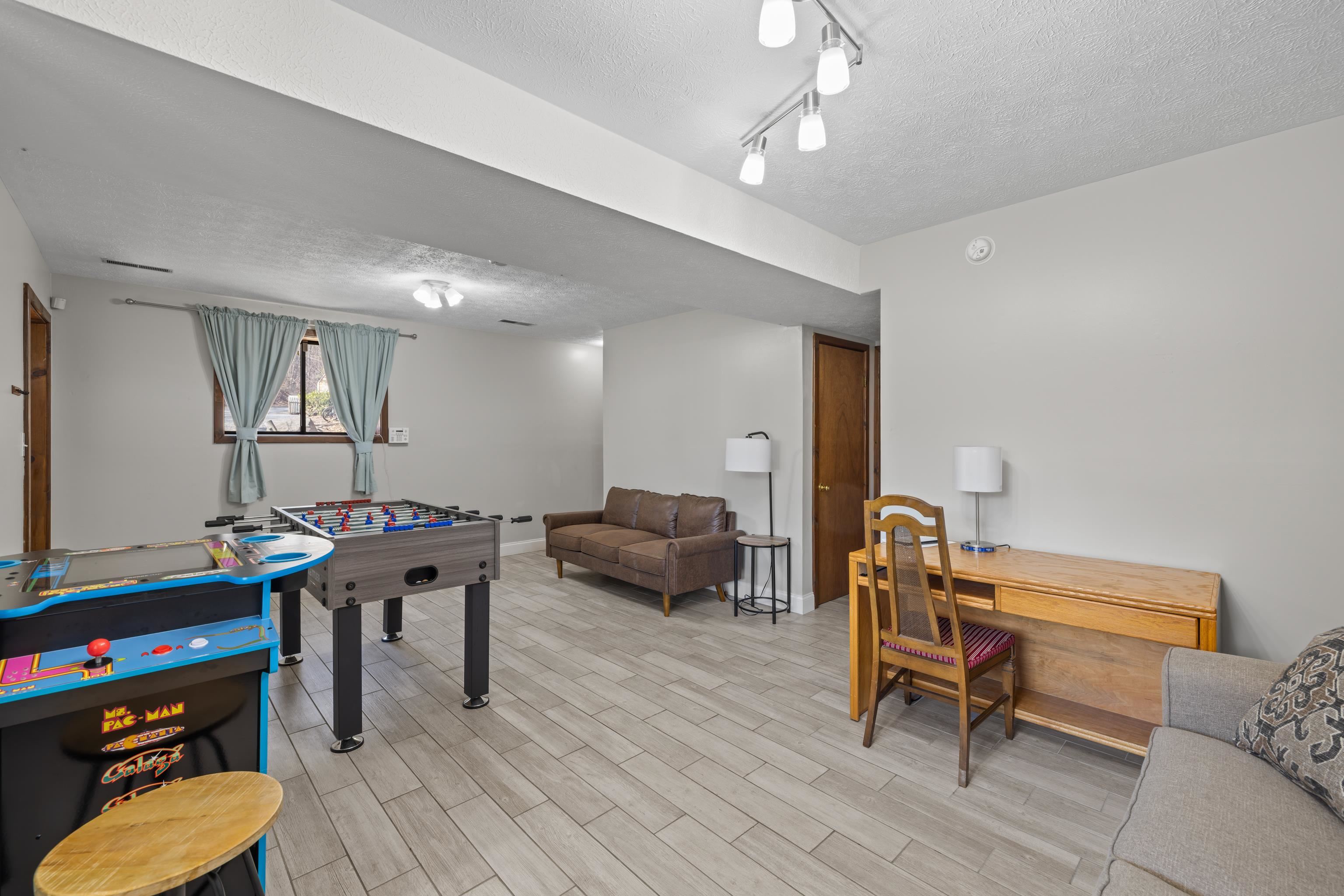673 Killmon Road Basye, VA 22810 - Photo 43 of 74 a living room with furniture and wooden floor