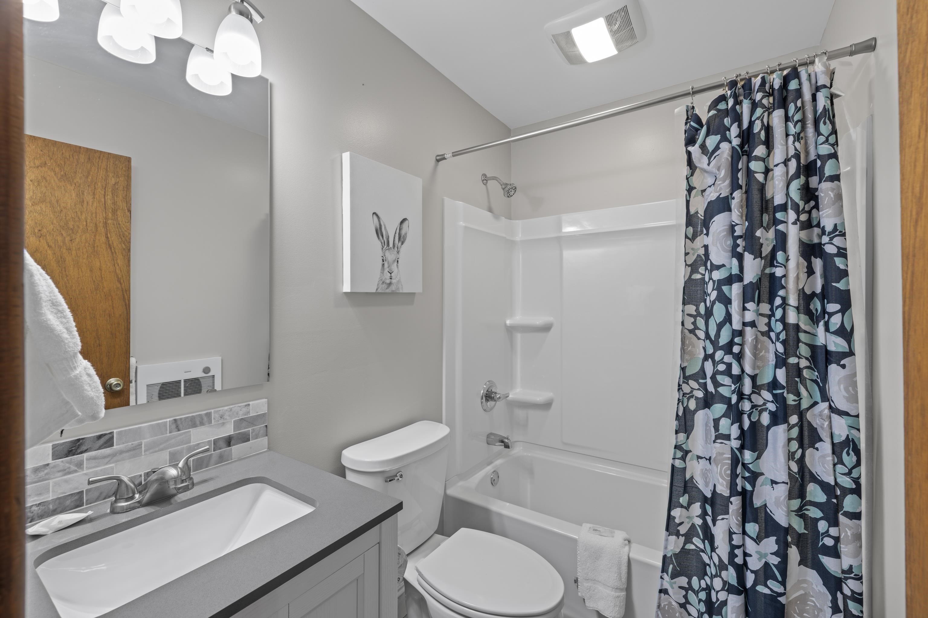 673 Killmon Road Basye, VA 22810 - Photo 44 of 74 a bathroom with a sink toilet tub and shower