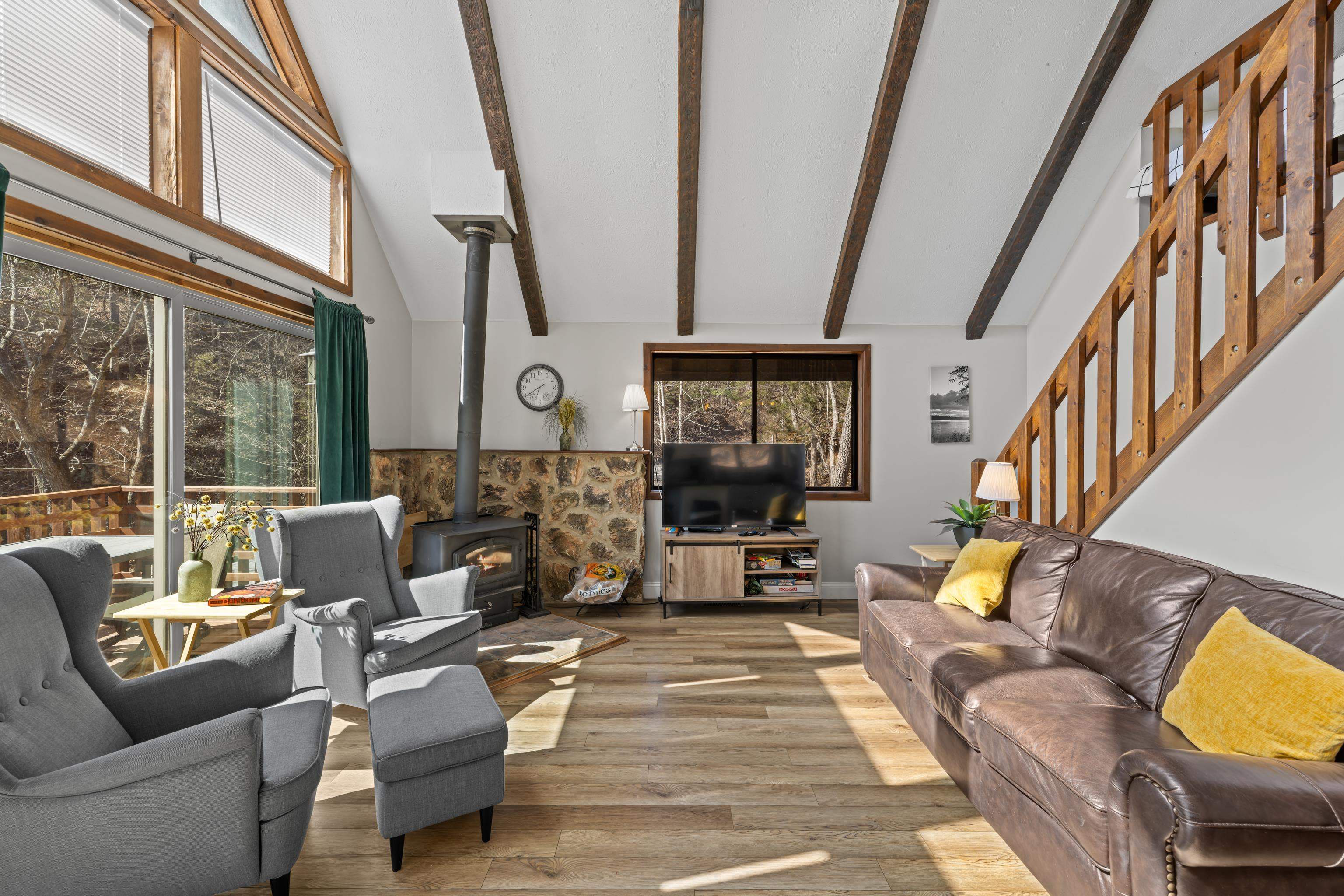 673 Killmon Road Basye, VA 22810 - Photo 5 of 74 a living room with furniture or couch and a potted plant next to a window