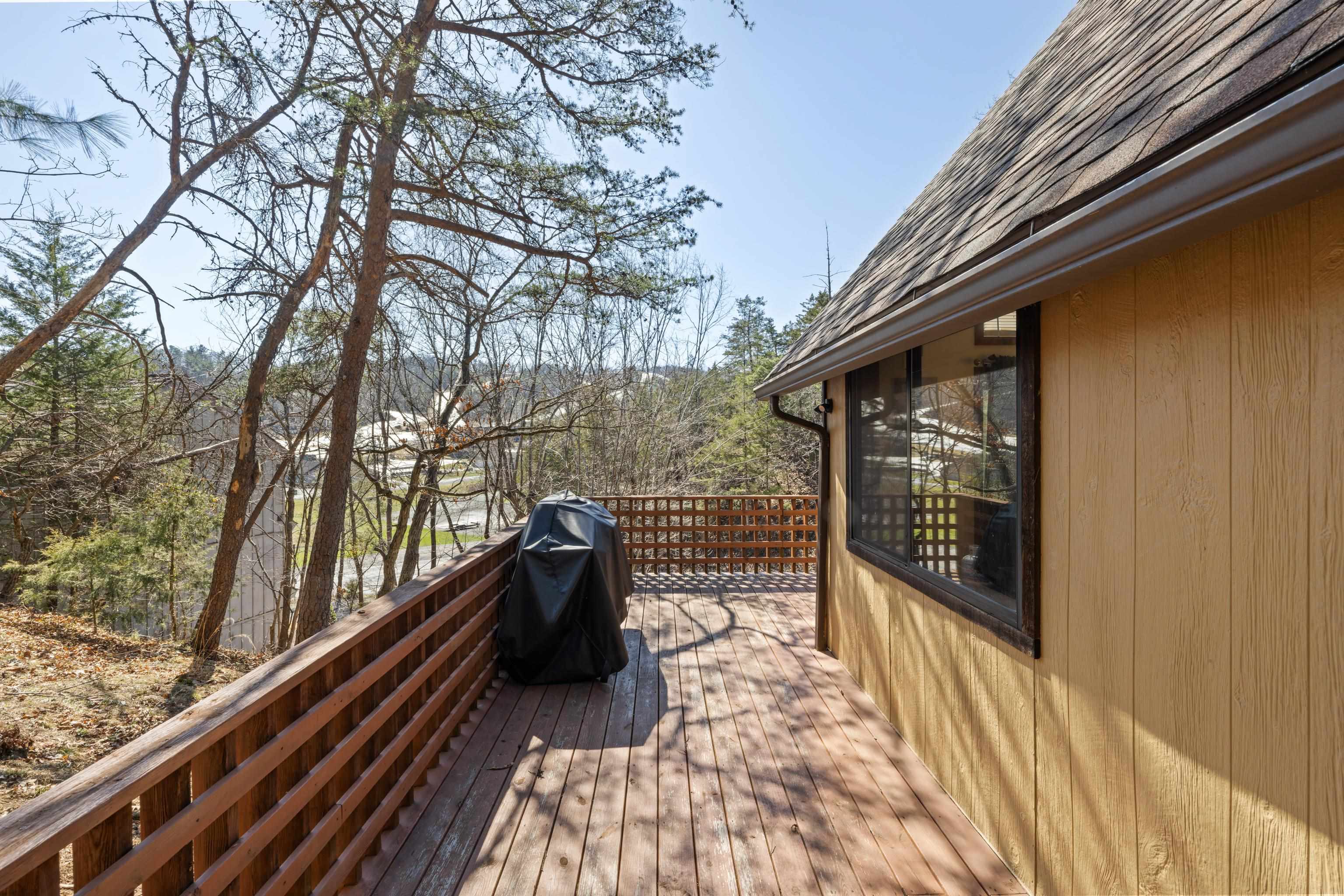 673 Killmon Road Basye, VA 22810 - Photo 53 of 74 a balcony with wooden floor and outdoor seating