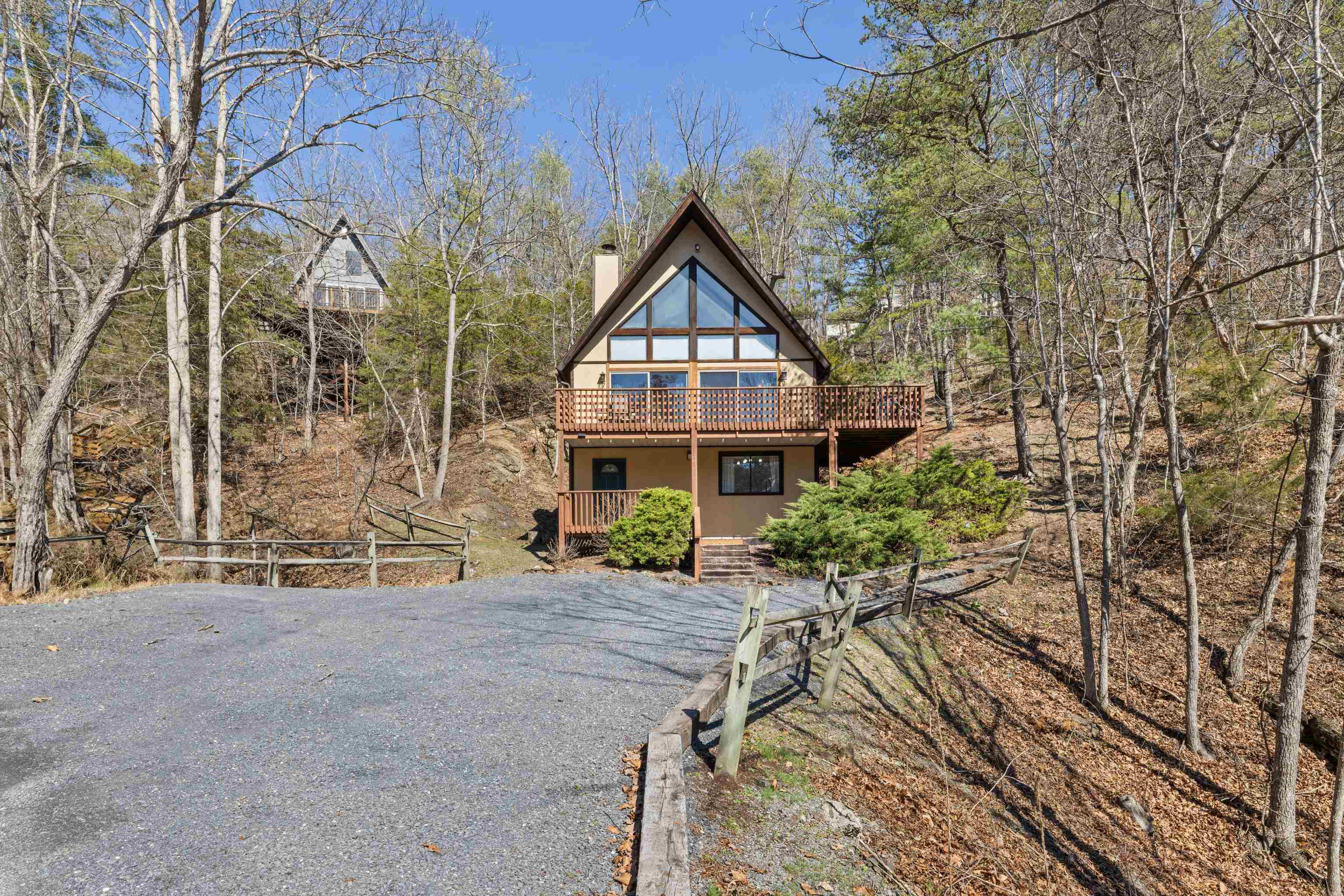 673 Killmon Road Basye, VA 22810 - Photo 57 of 74 front view of a house with a yard