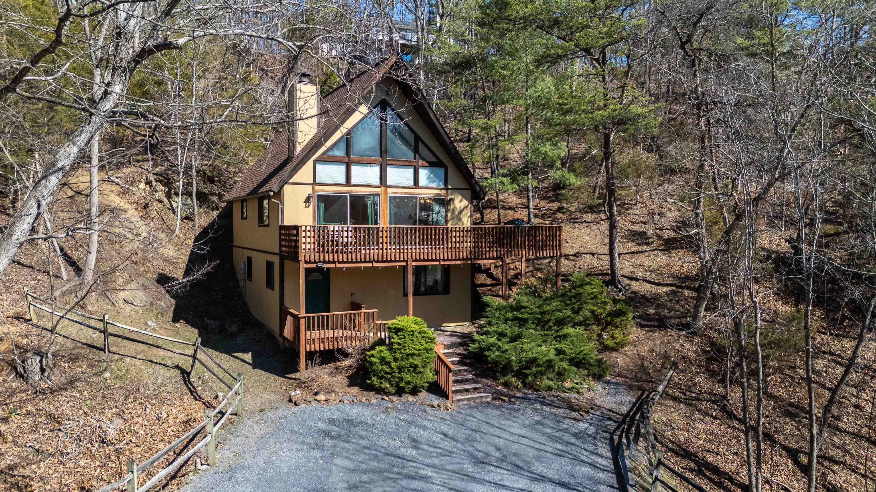 673 Killmon Road Basye, VA 22810 - Photo 62 of 74 front view of a house with a yard