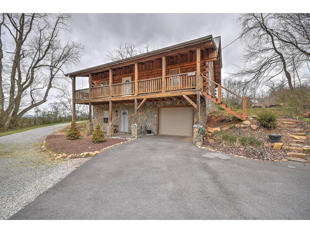 345 Rocky Branch Road Elizabethton, TN 37643 - Photo 1 of 36 Cozy Log Cabin