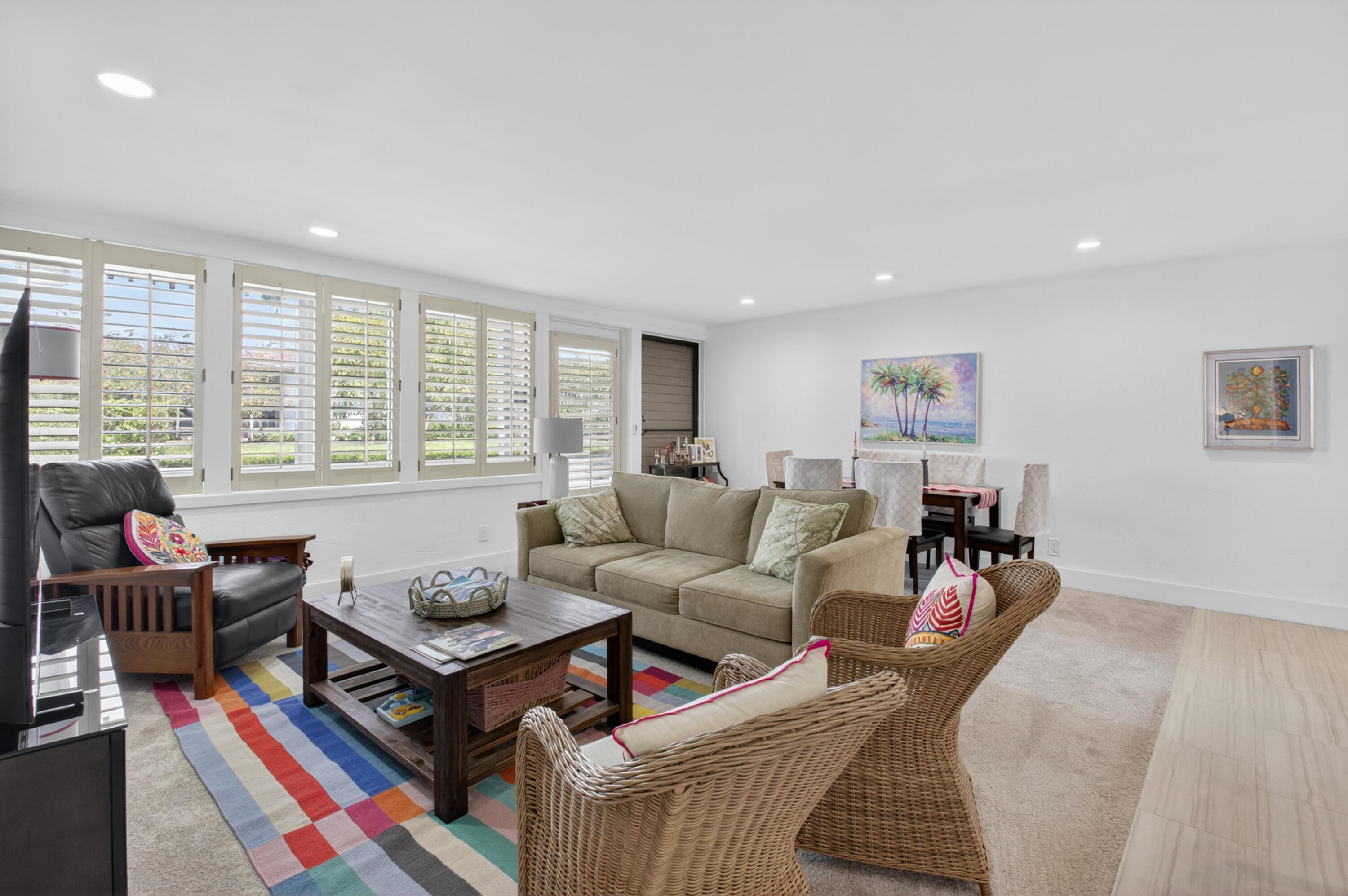 19981 Boca W Drive, Unit 3123 Boca Raton, FL 33434 - Photo 11 of 57 a living room with furniture and a large window