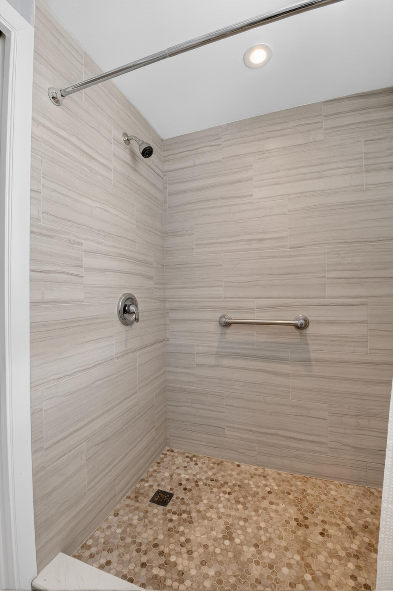 19981 Boca W Drive, Unit 3123 Boca Raton, FL 33434 - Photo 19 of 57 a bathroom with a shower