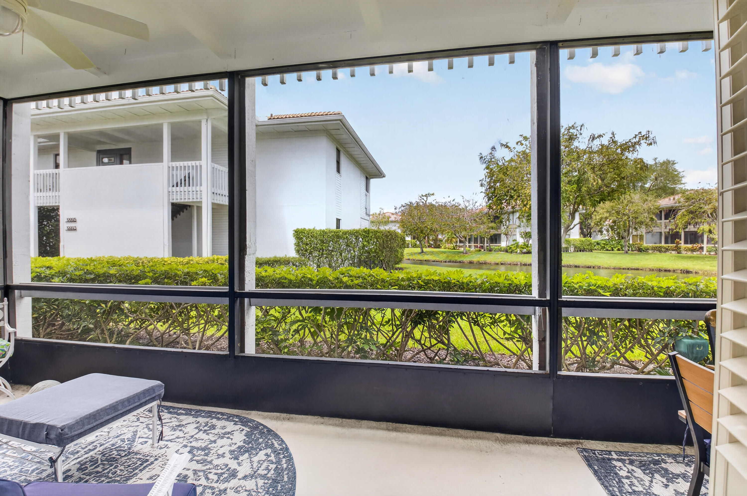 19981 Boca W Drive, Unit 3123 Boca Raton, FL 33434 - Photo 5 of 57 a view of two chairs in a balcony