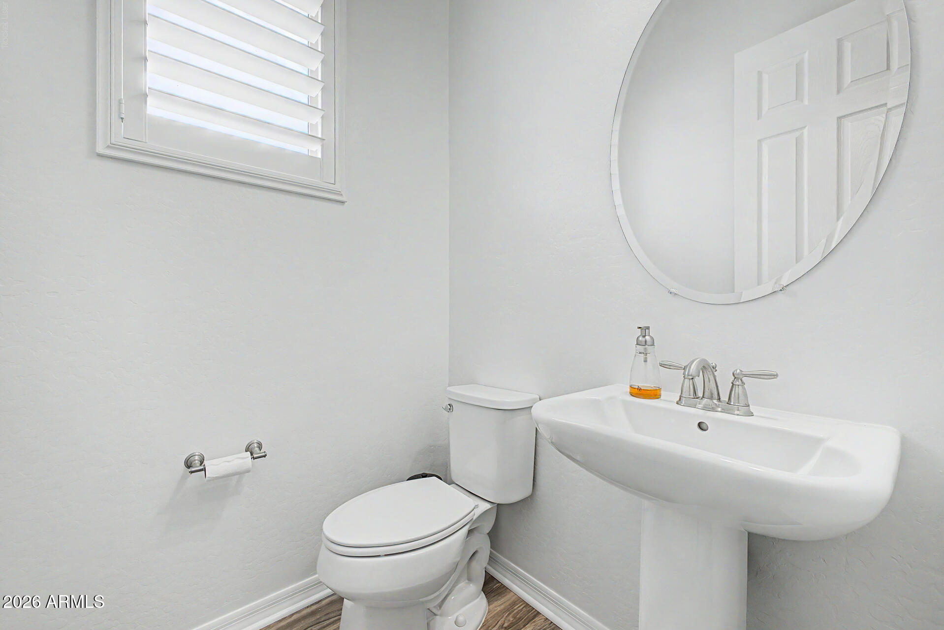 1076 East Kensington Road Gilbert, AZ 85297 - Photo 13 of 73 a bathroom with a sink and a toilet